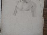 a drawing of a woman in a wedding dress on a piece of paper
