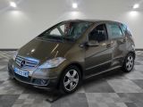 a picture of a mercedes b - class parked in a showroom