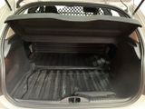 the back of a car with the trunk open showing the cargo area