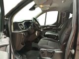 a view of the inside of a vehicle from the driver ' s seat