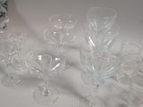 a lot of wine glasses sitting on a table