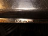 a close up of a metal object with a number on it