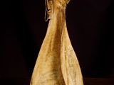 a wooden vase that is sitting on a table