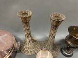 a lot of silver objects that are on the table