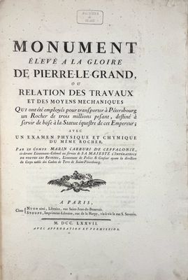 un vieux livre sur lequel figure l'image en noir et blanc d'un oiseau