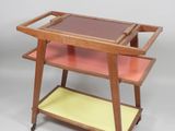 an image of a wooden serving cart with two trays