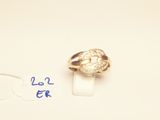 a gold ring with a diamond on top of it