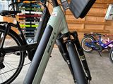 a bike that is parked in a garage with other bikes
