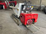 a small machine that is parked in a garage