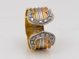 an image of two gold and silver rings with diamonds on them