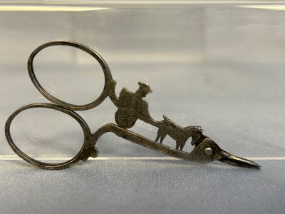 a pair of scissors that are sitting on a table