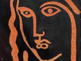 an orange and black painting of a woman ' s face on a black background