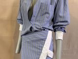 an image of a mannequin dressed in a blue and white shirt and skirt