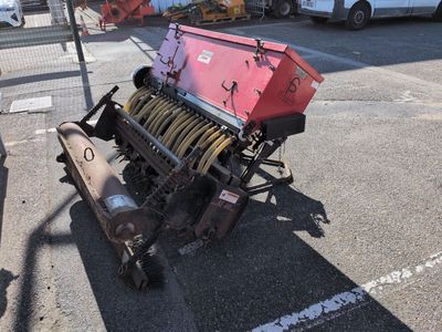 an image of a machine that is sitting in the parking lot