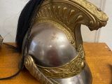 a helmet on a table with a cord attached to it