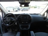 a view of the inside of a car from the driver ' s seat
