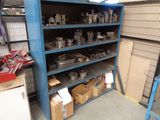 a blue shelving with lots of tools on it