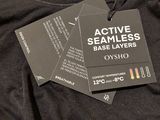 a black t - shirt with a tag on it that says active seamless base layers