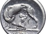 an image of a silver coin with a dog on it ' s back