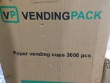a cardboard box that has a paper vending cup in it
