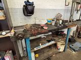an image of a workbench in a garage with tools on it