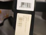 a tag hanging from the back of a luggage bag