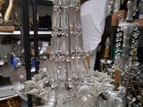 a glass chandelier that is sitting on a table
