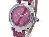 a close up of a wrist watch with a pink dial