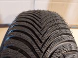 a close up of a tire on a wooden surface