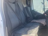 a white van with two seats in the back of it