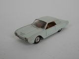 a toy car that is sitting on a white surface