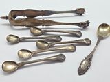 a lot of spoons and spoon spoons on the table