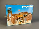 a box of playmobil with a picture of a horse drawn carriage