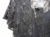 black lace top with sequins and sequins on the shoulders