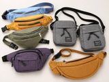 a group of four different fanny bags sitting on top of each other