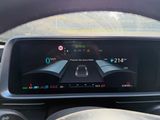 the dashboard of a car with a digital display on it