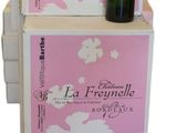 boxes of wine are stacked on top of each other with a bottle of wine