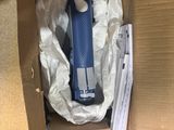 a box with a toothbrush in it that is inside of it