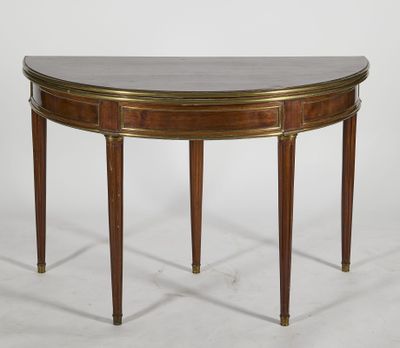 a mahogany and brass console table