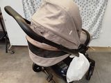 a baby stroller that is sitting in a room