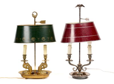 two lamps that are next to each other on a table