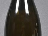a bottle of wine that is sitting on a table