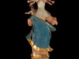 an image of a statue of a woman with a crown on her head
