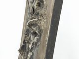 a close up of a piece of wood with a piece of wood sticking out of it