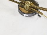 a clock that has a bunch of sticks in it