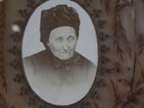a picture of a picture of an old woman in a picture frame
