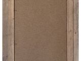an old wooden frame with a piece of brown paper on it