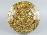 yellow and clear glass plate with a gold design on it