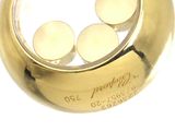 an image of a close up of a gold ring with four white dots