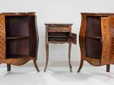 two pieces of furniture that are sitting next to each other